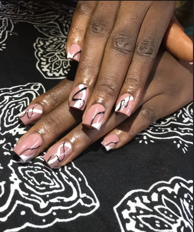 Nude square nails with white shapes and fine black swirl line art
